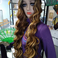 Chocolate body wigs on sale in West Saint Paul at Optimismic Wigs and Gifts.