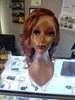 Buy custom colored wigs at Optimismic Wigs and Gifts.