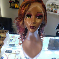 Buy custom colored wigs at Optimismic Wigs and Gifts.