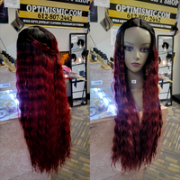 99J Synthetic wig with waves at Optimismic Wigs and Gifts 30 inches long.