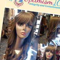 Brown Wigs for women. Beauty Supplies and Wig Stores near Minneapolis and St Paul Optimismic Wigs and Gifts. Raquel Chocolate synthetic glueless Wig 28 inches $25 at OptimismIC Wigs and Gifts Shop West St Paul MN