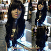 Nikki 28 inch wigs at Optimismic Wigs and Gifts long wavy wigs with highlights.